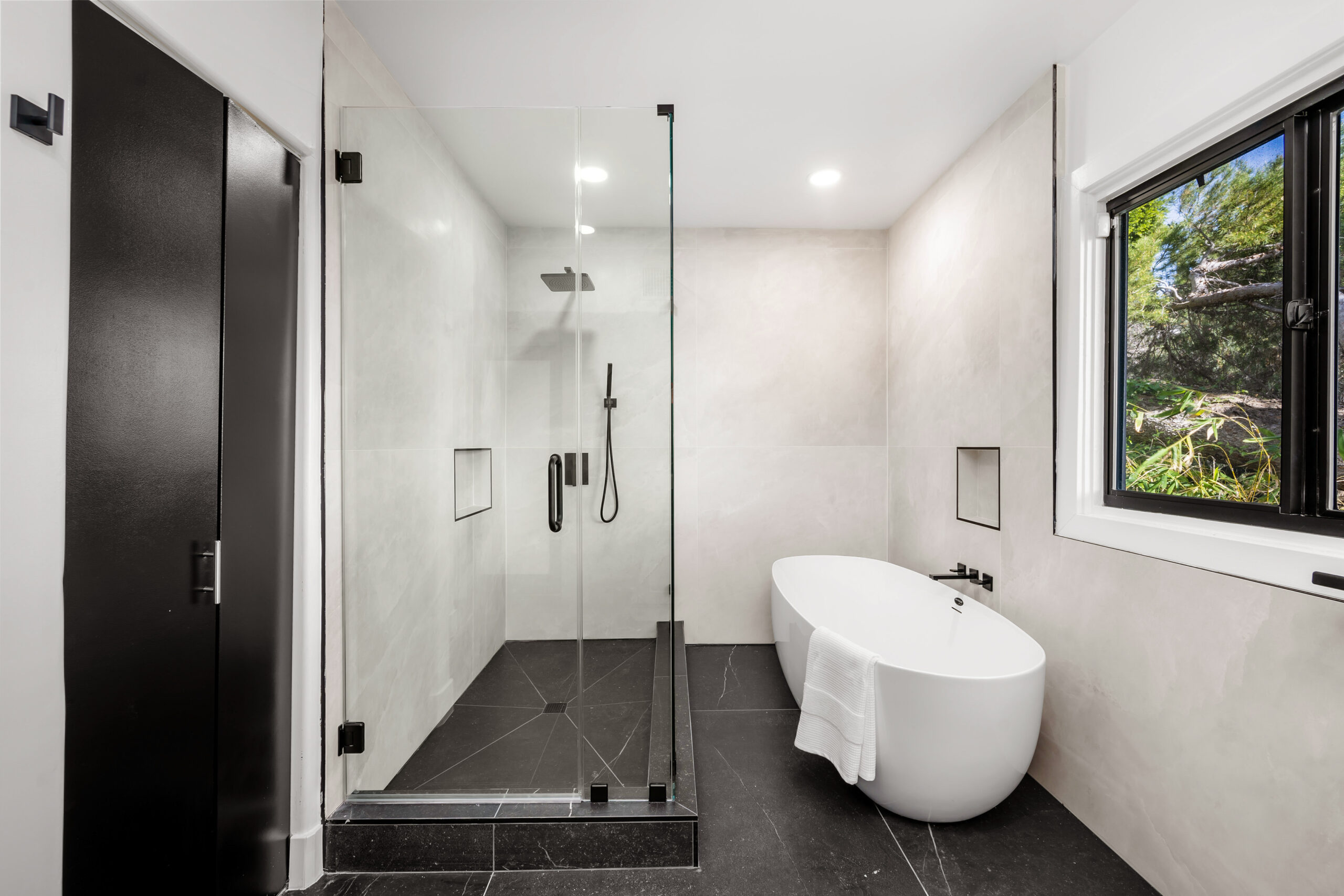 A modern Hollywood Hills home bathroom in Los Angeles, California, with a remodel of an older house